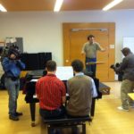 Channel 13's Raul and Andre capturing the action during a conducting class.