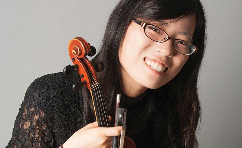 Tina Zhang, second violin, professional headshot.