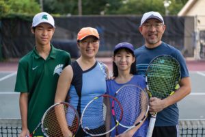 Wei Jiang, viola, playing tennis with his family.