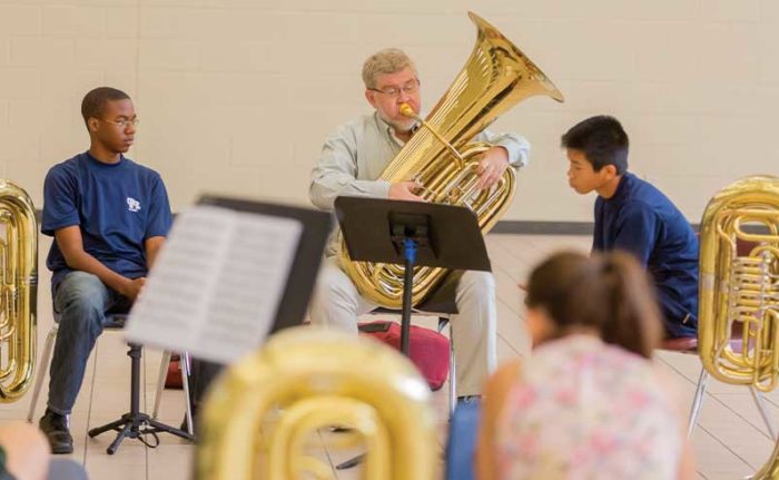 David Kirk, principal tuba, performs with Houston-area students.